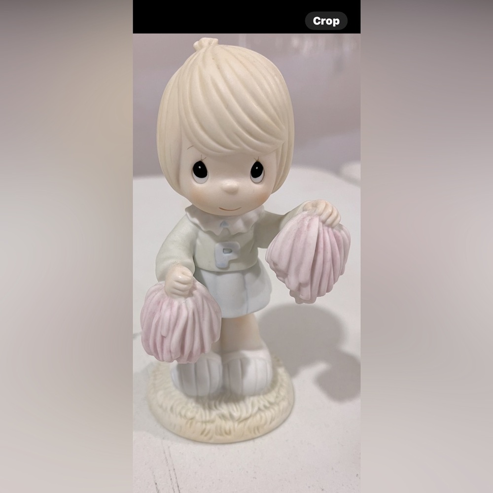 Charming Figurine with Pink Accents